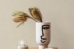 Interior design of living room with stylish dried flowers in vase, wooden coffee table, mock up poster frame, decoration and personal accessories in modern home decor.